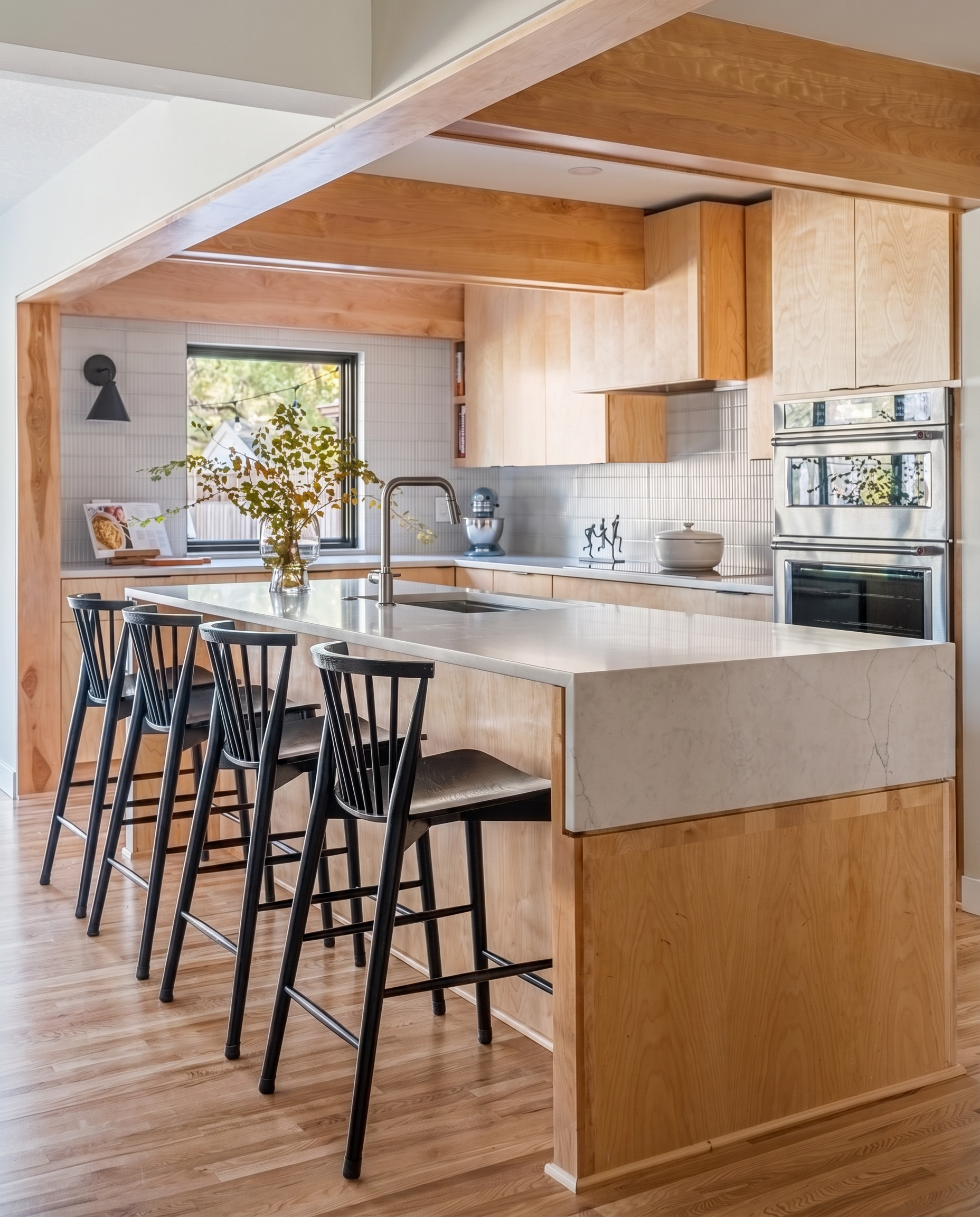 Open concept kitchen renovation with island and hardwood floors
